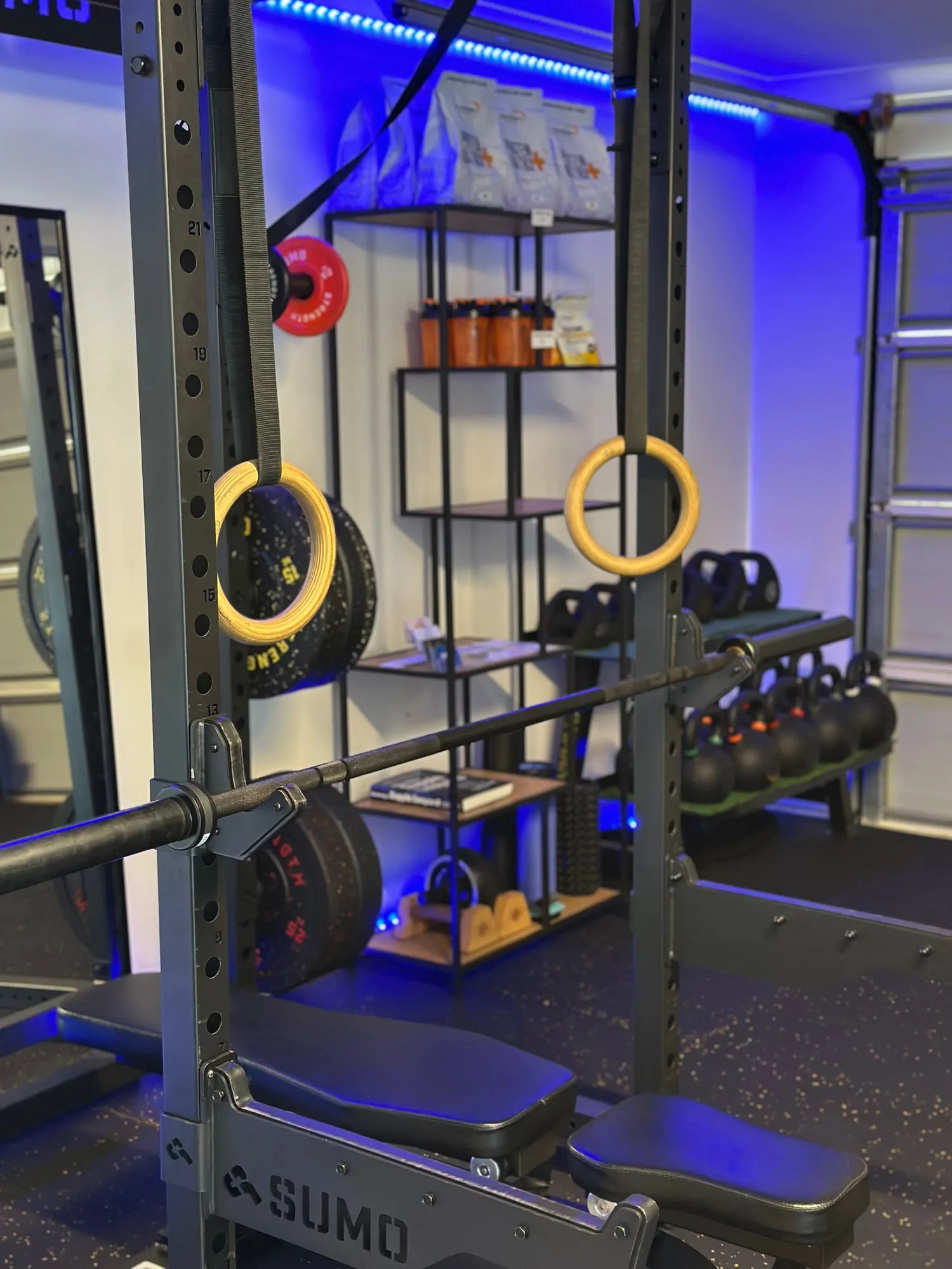Squat rack, gymnastic rings and kettlebells in the True Fit private gym in Peregian Springs